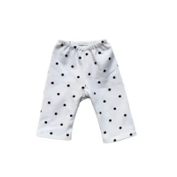 Legginsy w czarne kropki